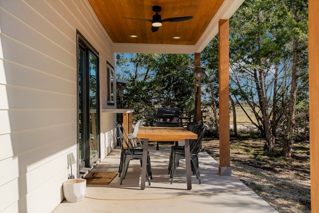 view of patio featuring ceiling fan