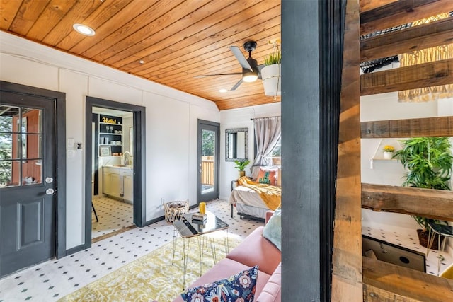 interior space with ceiling fan and sink