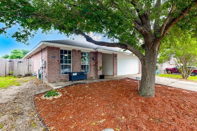 single story home with a garage