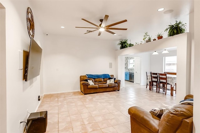 living room featuring ceiling fan and light tile patterned flooring