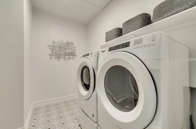 laundry room with separate washer and dryer