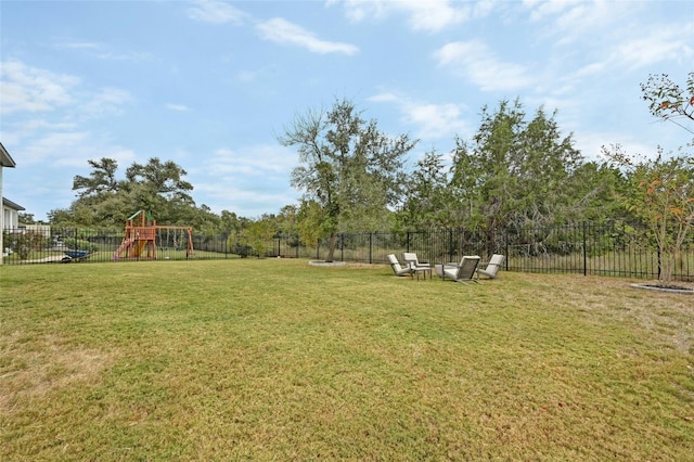 view of yard with a playground