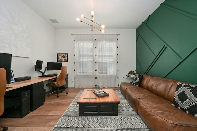 office featuring a notable chandelier and light wood-type flooring