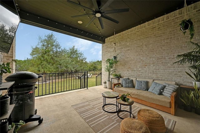 view of patio with outdoor lounge area, ceiling fan, and area for grilling