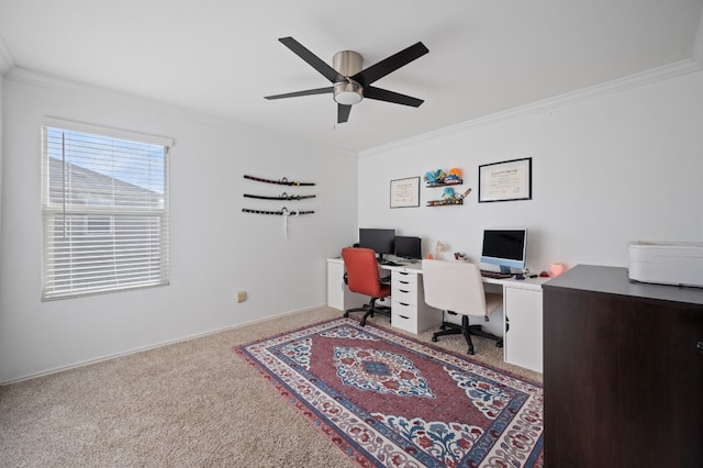 office featuring light colored carpet, ceiling fan, and ornamental molding