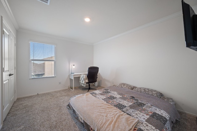 bedroom with crown molding and carpet