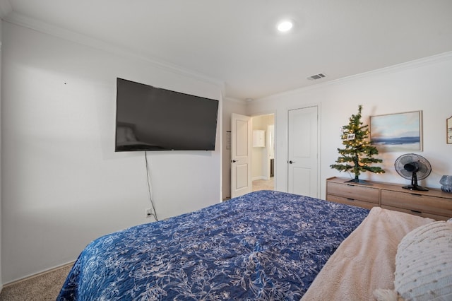 carpeted bedroom featuring ornamental molding