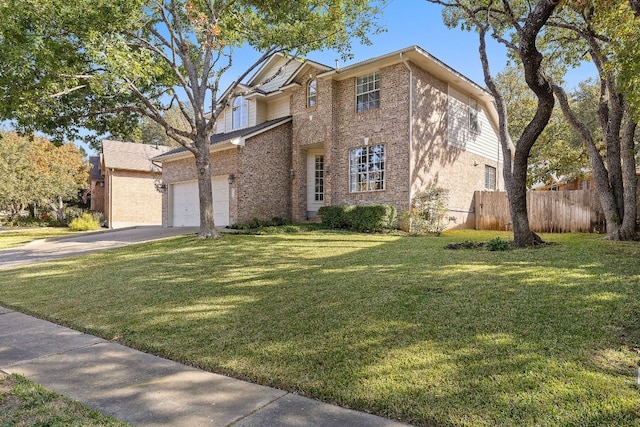 view of front facade featuring a front yard and a garage