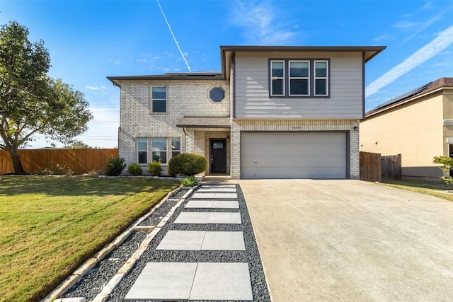 front of property with a front yard and a garage