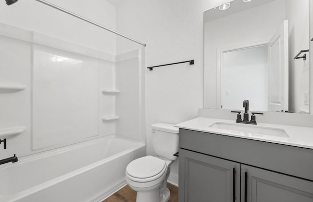 217 Canyoncrest Way, Liberty Hill, TX 78642 - full bathroom featuring vanity, wood finished floors, and shower / bathtub combination