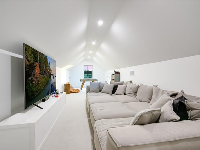 living room with carpet and vaulted ceiling