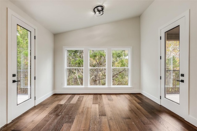 interior space with plenty of natural light and lofted ceiling