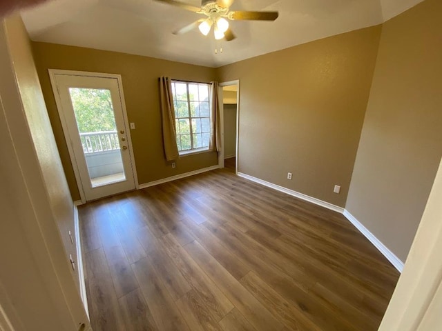 1005 N Lbj Dr Unit A-5, San Marcos, TX 78666 - unfurnished room featuring ceiling fan, dark wood-style floors, and baseboards