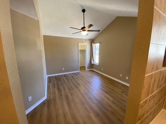1005 N Lbj Dr Unit A-5, San Marcos, TX 78666 - spare room featuring a ceiling fan, wood finished floors, vaulted ceiling, and baseboards
