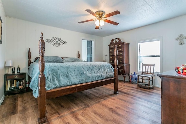 bedroom featuring ceiling fan and wood-type flooring