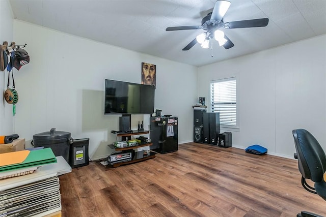 office space with hardwood / wood-style floors and ceiling fan