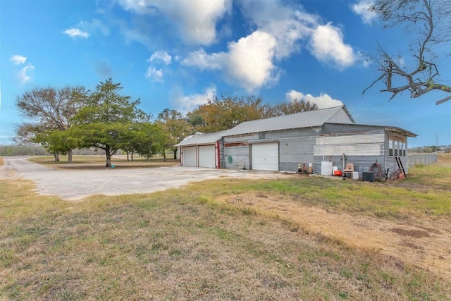 garage with a yard