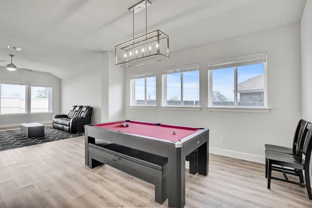 rec room with vaulted ceiling, light hardwood / wood-style flooring, plenty of natural light, and billiards