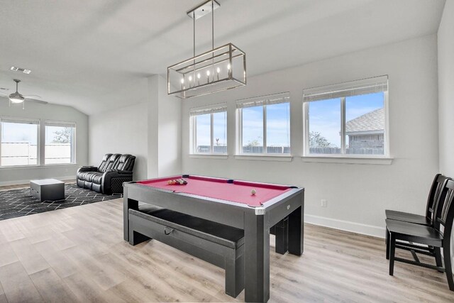 100 Patrick Herndon Dr, Bastrop, TX 78602 - rec room with wood finished floors, baseboards, billiards, vaulted ceiling, and ceiling fan