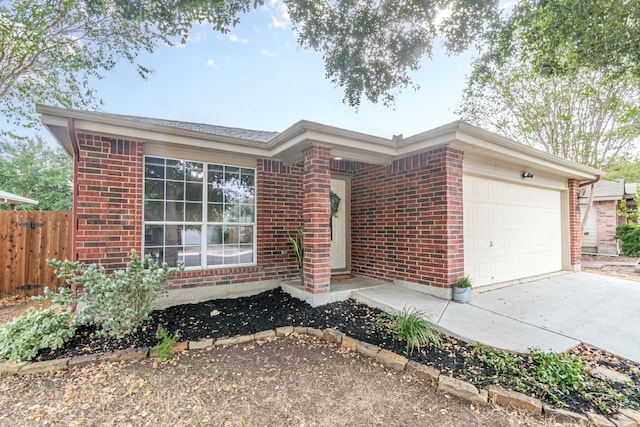 single story home featuring a garage