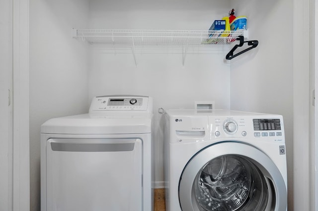 laundry area featuring washer and clothes dryer