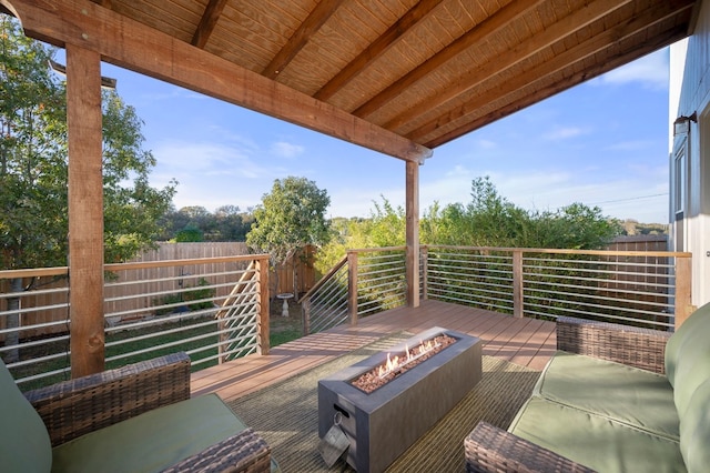 deck featuring a fire pit