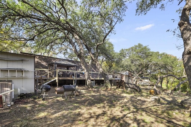 view of yard featuring a deck