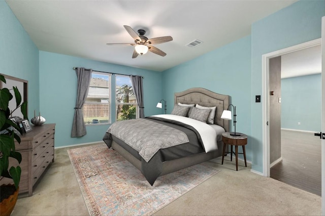 carpeted bedroom featuring ceiling fan