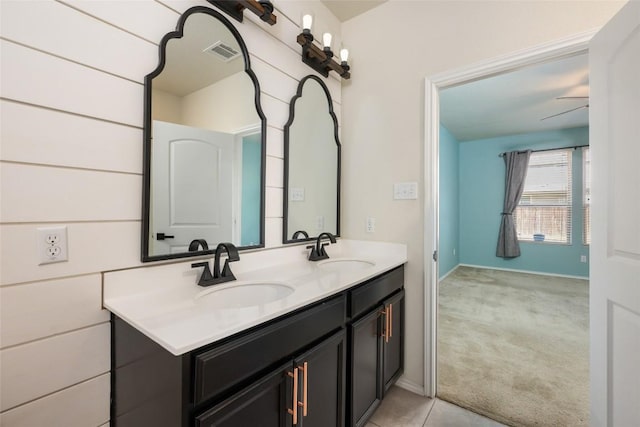 bathroom with vanity and ceiling fan