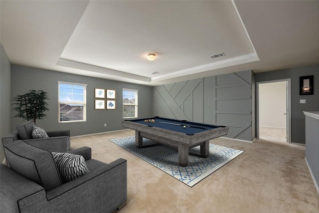 recreation room featuring light colored carpet, a raised ceiling, and pool table