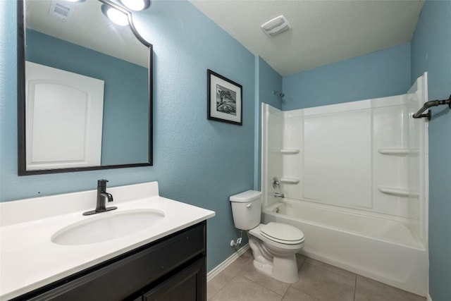 full bathroom with vanity, tile patterned flooring, toilet, a textured ceiling, and shower / bathtub combination