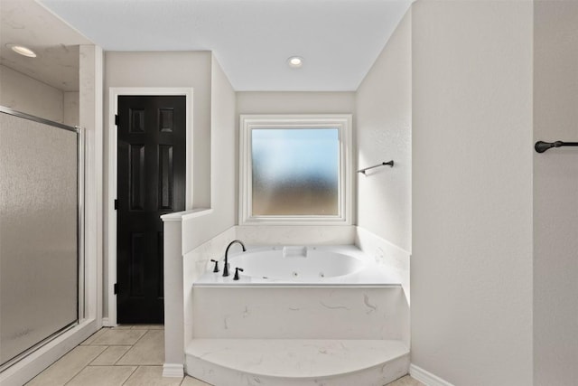 bathroom with plus walk in shower and tile patterned floors