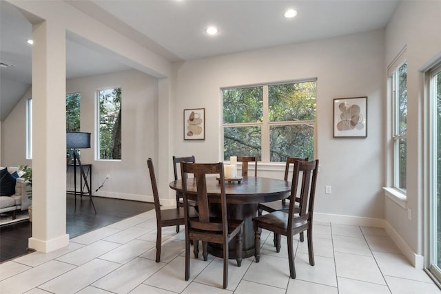 dining room with light tile patterned floors, visible vents, baseboards, and recessed lighting