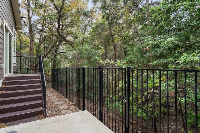 view of gate featuring fence