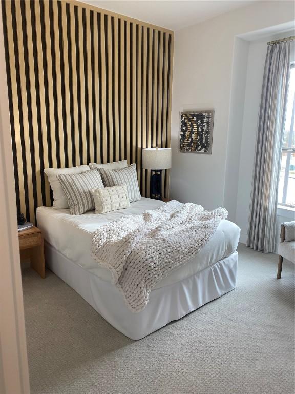 bedroom featuring carpet flooring