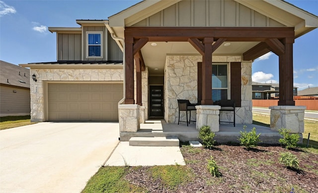 craftsman-style home featuring a porch and a garage