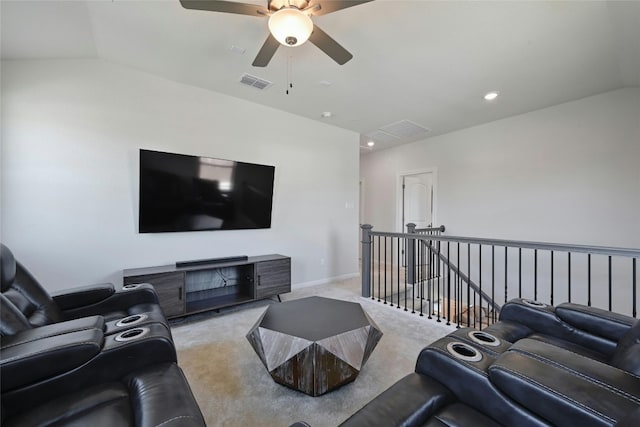 living room with light carpet, vaulted ceiling, and ceiling fan