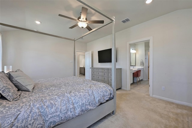 carpeted bedroom featuring connected bathroom and ceiling fan