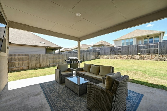 view of patio with an outdoor living space and grilling area