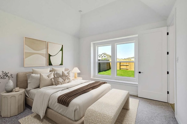 596 Biscayne Bay Bnd, Kyle, TX 78640 - bedroom with lofted ceiling and light colored carpet