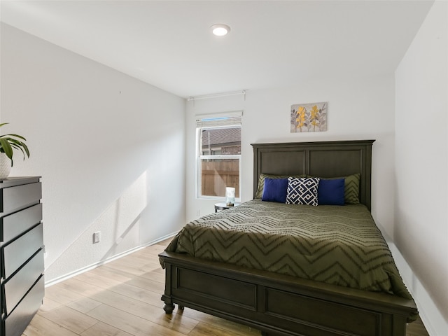 bedroom featuring light wood-type flooring