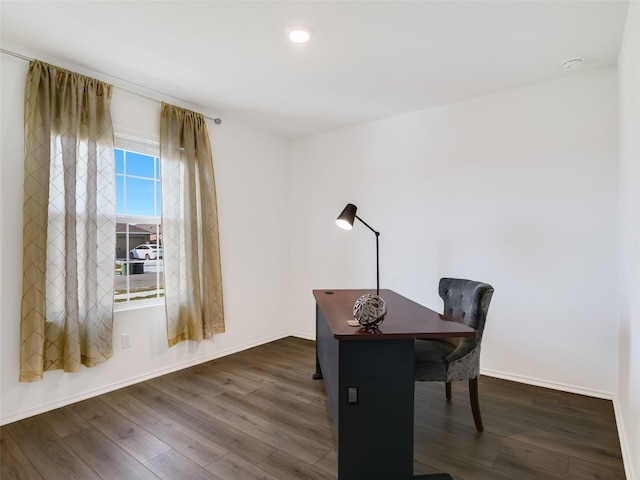 office with dark hardwood / wood-style floors