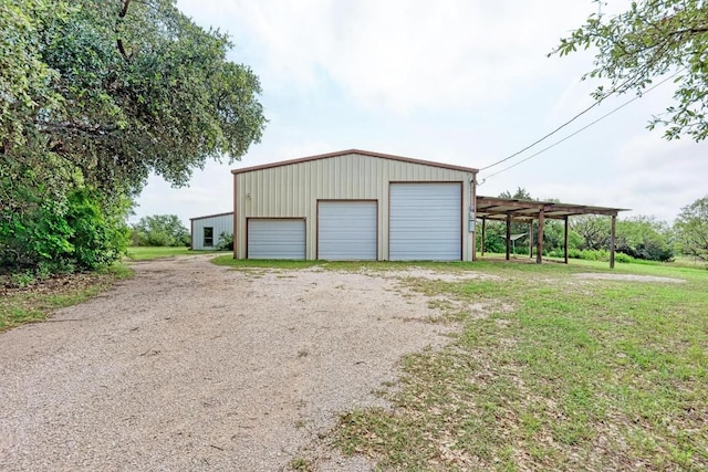 garage with a lawn