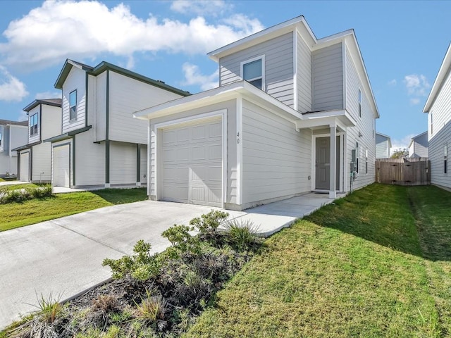 40 Trinity Cir, Lockhart, TX 78644 - view of front facade with an attached garage and driveway