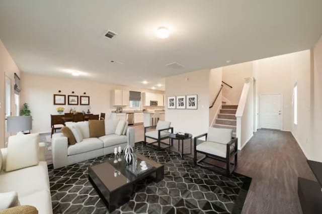 living room featuring dark hardwood / wood-style floors