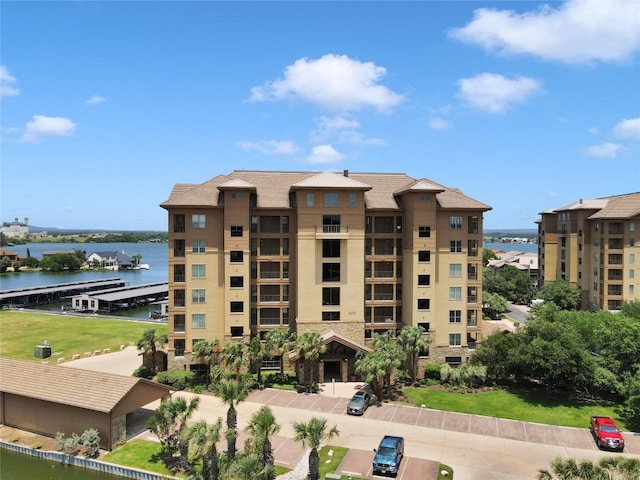 view of property with a water view