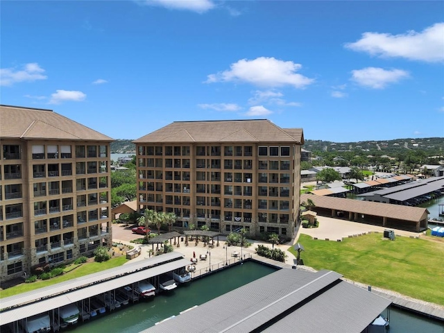 view of building exterior with a water view