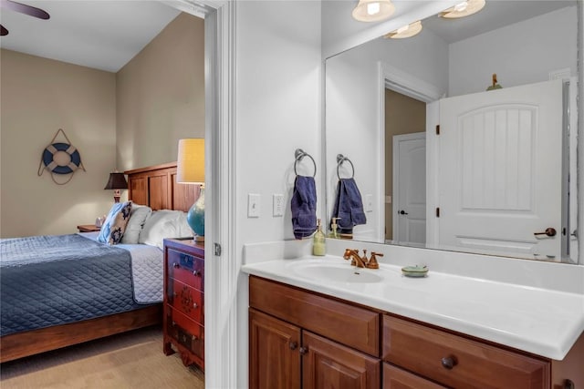 bathroom with vanity and ceiling fan