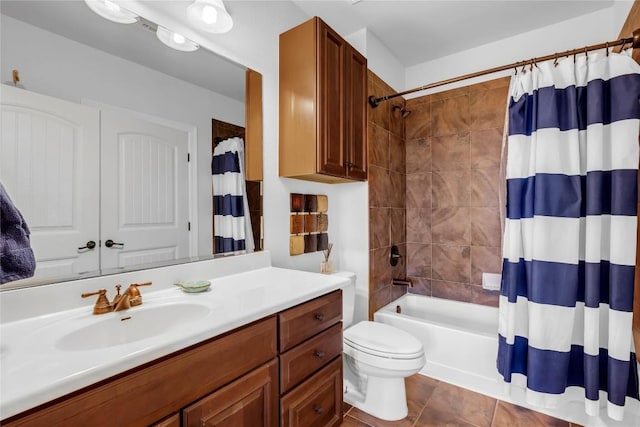 full bathroom featuring tile patterned flooring, vanity, toilet, and shower / bath combo with shower curtain