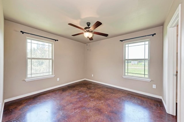 unfurnished room with plenty of natural light and ceiling fan